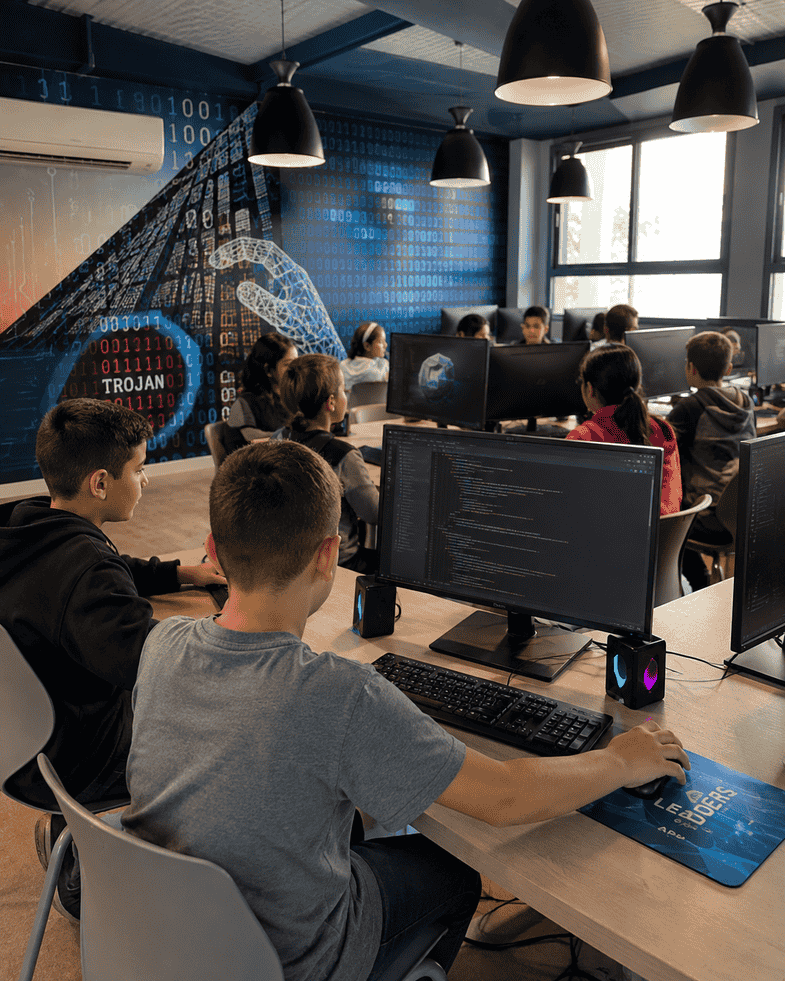 Students learning cybersecurity and coding at Leaders App